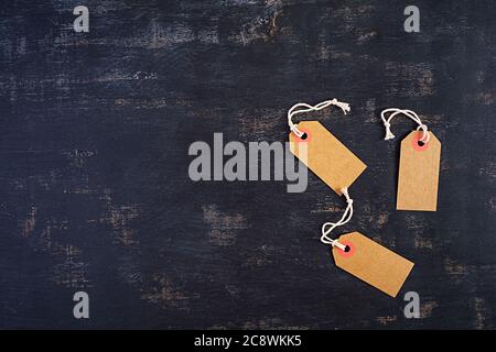 Blank label tag isolated on dark background. Price tag. Sale concept. Stock Photo