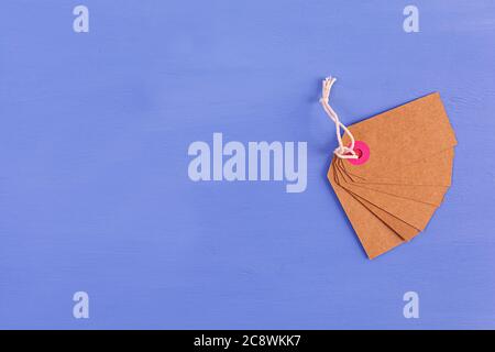 Blank label tag isolated on blue background. Price tag. Sale concept. Stock Photo