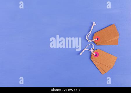 Blank label tag isolated on blue background. Price tag. Sale concept. Stock Photo