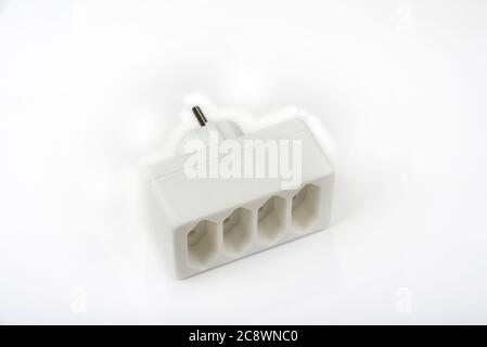 220V electric splitter on a white background Stock Photo - Alamy