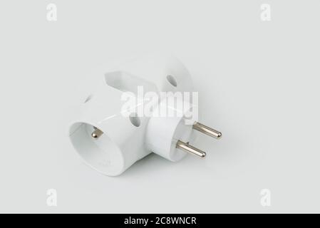 220V electric splitter on a white background Stock Photo - Alamy