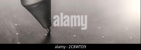 Pen or stylus of an electronic graphics tablet. Stock Photo