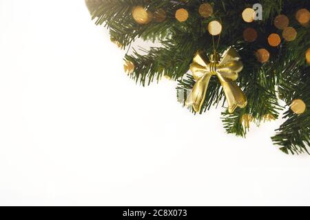 Gold Christmas background of defocused lights with decorated tree. Christmas 2021 decorations Stock Photo