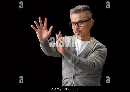 Gestures to imagine, a senior designer Stock Photo