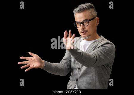 Gestures to imagine, a senior designer Stock Photo