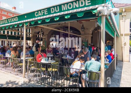 Crowded Cafe du Monde where they sell their famous beignets in New Orleans, Louisiana, USA,