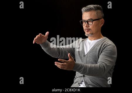 Gestures, a senior designer Stock Photo