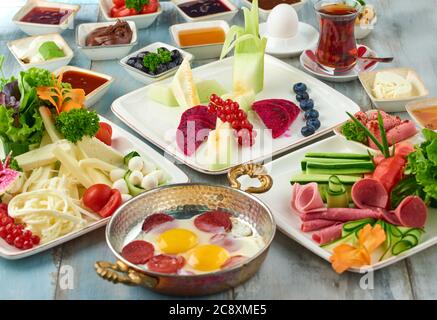 Delicious traditional turkish breakfast on wooden table Stock Photo