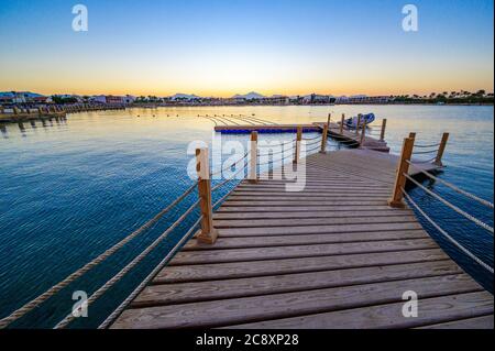 Wooden Pier on Red Sea in Hurghada at sunset, Egypt - travel destination in Africa Stock Photo