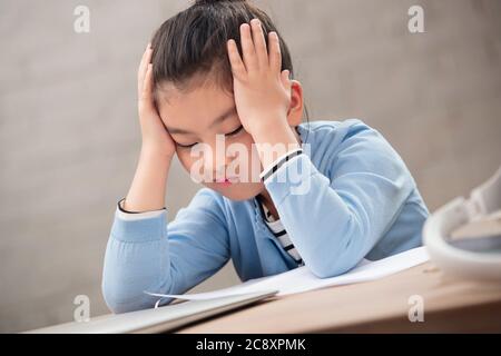 Tired of elementary school girls Stock Photo