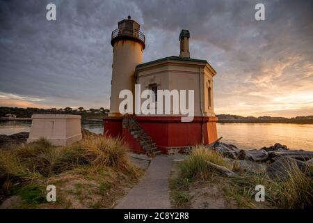 The Coquille River Lighthouse in Bandon, Oregon at sunset Stock Photo