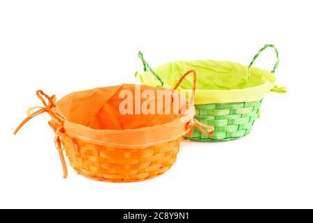 Two empty wicker baskets isolated on white background. Stock Photo