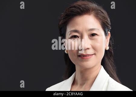 Ms elegant mature business of authority Stock Photo - Alamy