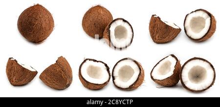 Halves of broken coconuts on a white background. Macro photo. Coconut set. Stock Photo