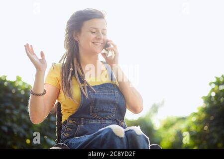 happy attractive girl enjoying chatting with best friends, sharing secrets, news. happiness. close up portrait. gossip concept Stock Photo