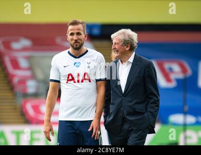 London, UK. 26th July, 2020. Tottenham's Harry Kane and Crystal Palace manager Roy Hodgson after the Premier League match between Crystal Palace and Tottenham Hotspur, Football Stadiums around remain empty due to the Covid-19 Pandemic as Government social distancing laws prohibit supporters inside venues resulting in all fixtures being played behind closed doors until further notice at Selhurst Park, London, England on 26 July 2020. Photo by Andrew Aleksiejczuk/PRiME Media Images. Credit: PRiME Media Images/Alamy Live News Stock Photo
