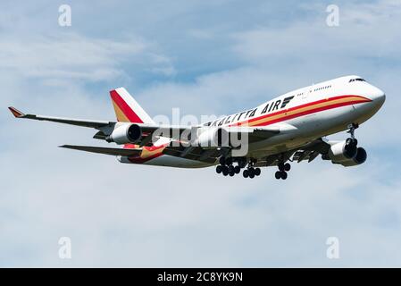 A Boeing 747 cargo airplane of Kalitta Air is ready to land at the Ramstein Air Base. Kalitta Air is an American cargo airline. Stock Photo