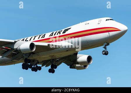 A Boeing 747 cargo airplane of Kalitta Air is ready to land at the Ramstein Air Base. Kalitta Air is an American cargo airline. Stock Photo