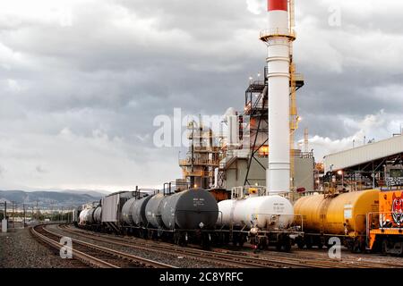 Pocatello, Idaho, USA . Aug, 21, 2006  Rail tank cars on a siding at the J.R. Simplot factory wating to unloade sulfer and ammonia. Stock Photo