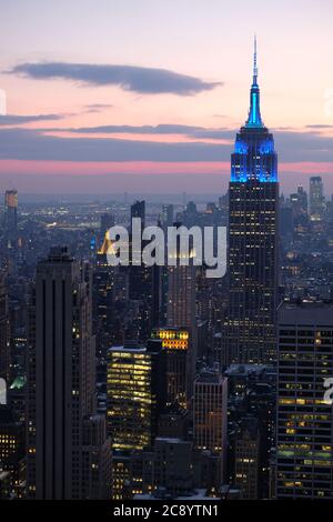 New York, USA-December 2017: Manhattan city skyline, including the Empire State Building, at dusk as seen from the Top of the Rock Stock Photo