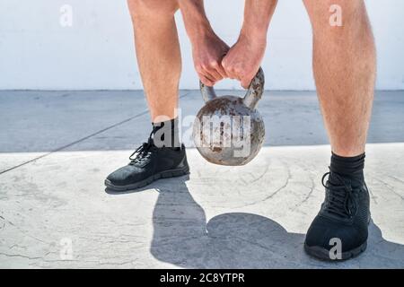 Fitness man training lifting kettlebell weight Stock Photo