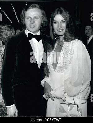 Jul. 5, 1973 - London, England, United Kingdom - The royal premiere of the new James Bond film ''Live and Let Die'' held at the Odeon theater Leicester Square. Star of the film are actress JANE SEYMOUR arrives with her husband, MICHAEL ATTENBOROUGH. (Credit Image: © Keystone Press Agency/Keystone USA via ZUMAPRESS.com) Stock Photo