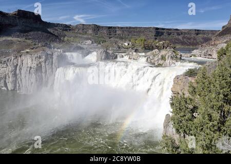 Shoshone Falls in Twin Falls, Idaho is created where the snake river crashes over ancient basalt flows.  The powerful water has been harnessed to crea Stock Photo