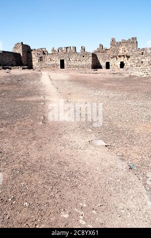 The interior courtyard of the eastern desert castle of Qasr al-Azraq near the town of Azraq, in the Badia region of the Hashemite Kingdom of Jordan. Stock Photo