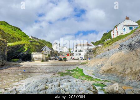 wide angle scenic view of the traditional Cornish village Portloe,  with the Fishing boats on the beach on the south Cornwall coast. UK Stock Photo