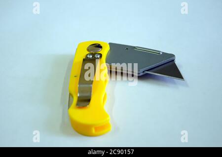 Typical stainless steel office paper cutter. Isolated on white background  with shadow reflection. With clipping path. Paper-cutter on white bg. Office  Stock Photo - Alamy