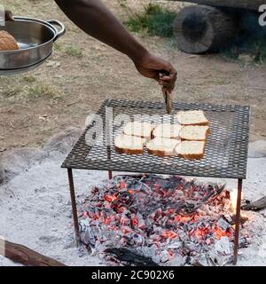 Making breakfast at Safari camp in South Luangwa National Park, Zambia. Stock Photo