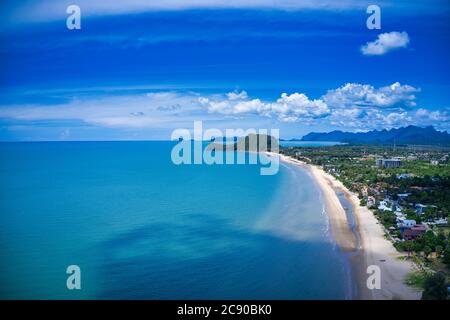 This unique photo shows the beach at Pak Nam Pran in Thailand photographed from above. You can see the sea and a mountain formation in the background Stock Photo