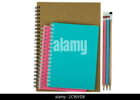 Pencil on top of book on the white background Stock Photo