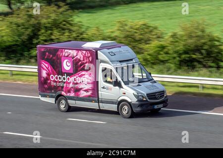 Ocado fridge on-line supermarket delivery cabbage van, refrigerated food transport, chilled food items, temperature controlled, refrigerated container, frozen foods,  temperature-sensitive goods on the M61 motorway, UK Stock Photo