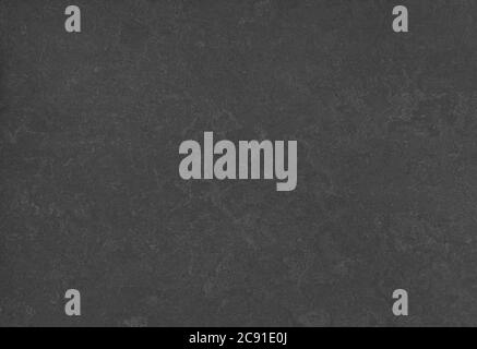 Patterned rubber tiles abstract background material floor dark gray black color Stock Photo