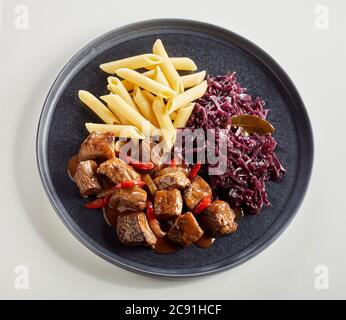 Red cabbage over black background Stock Photo - Alamy