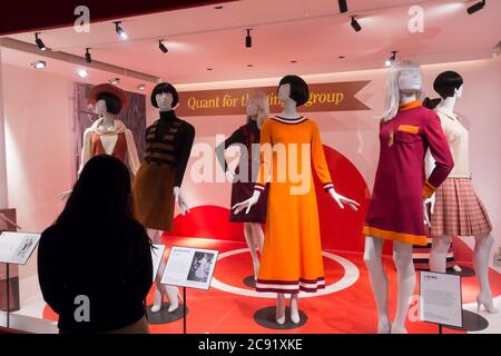 Female looking at display, Mary Quant's fashion exhibition at V&A, London, UK Stock Photo