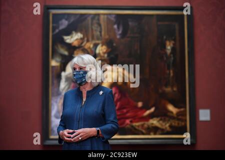 The Duchess of Cornwall delivers a speech during a visit to the recently reopened National Gallery in London, meeting members of staff involved in the organisation's Covid-19 response and reopening process. Stock Photo