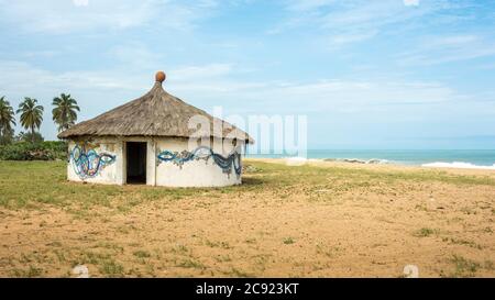 hut with a thatched roof in africa coast, Ouidah in benin Stock Photo