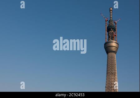 Tokyo, Japan. 4th Feb, 2011. Cranes at the Tokyo Skytree construction site in Japan.Tokyo Sky Tree under construction. In this image this new telecommunication tower stands at 398 metres and when finished will measure 634 metres from top to bottom making it the tallest structure in East Asia. Oshiage, Tokyo, Japan. Credit: Damon Coulter/SOPA Images/ZUMA Wire/Alamy Live News Stock Photo