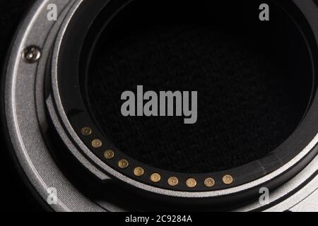 Contact group on the lens on a black background Stock Photo
