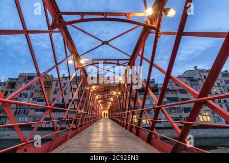 Eiffel Bridge (Pont de les Peixateries Velles), red iron bridge over the Onyar River, downtown, Girona, Spain Stock Photo