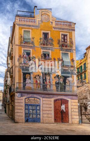 Facade with Mural by Carles Arola Vera on Placa Dels Sedassos Tarragona Catalonia Spain Stock Photo