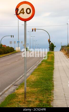 Maximum speed limit 40 kilometres per our sign modified with a painted 2 to indicate a maximum speed limit of 240 kilometres per hour Stock Photo