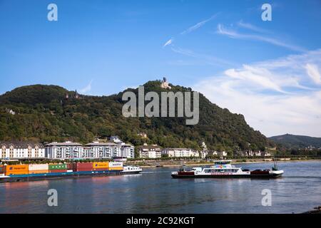 Drachenfels mountain with castle and ruin Drachenburg above Koenigswinter, car ferry and container vessel on river Rhine, North Rhine-Westphalia, Germ Stock Photo