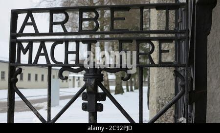 Dachau Germany, Europe - Feb 16, 2013 -entrance gate of Dachau concentration camp. Today is a monument to peace. Arbeit macht frei is a German phrase Stock Photo