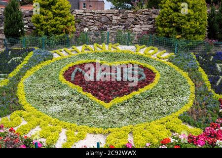 Floral display thanking the NHS during the Covid-19 pandemic in The Lodge Gardens in North Berwick, East Lothian, UK Stock Photo