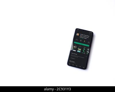 Lod, Israel - July 8, 2020: EyeEm - Sharing & Selling Images app play store page on the display of a black mobile smartphone isolated on white backgro Stock Photo