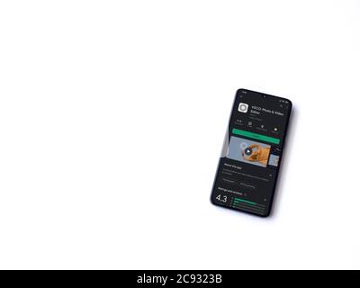 Lod, Israel - July 8, 2020: VSCO - Photo & Video Editor app play store page on the display of a black mobile smartphone isolated on white background. Stock Photo