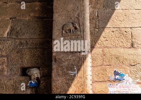 Trichy, Tamil Nadu, India - February 2020: An ancient carving of an elephant on the stone walls of the Ranganathaswamy temple in Srirangam. Stock Photo